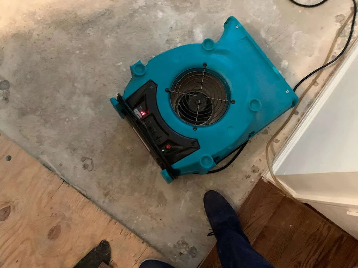Air mover drying subfloor during Leak Detection & Repair in Gastonia